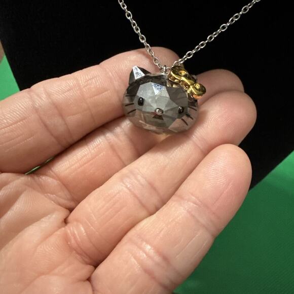 SWAROVSKI SANRIO HELLO KITTY CRYSTAL FACE JET GOLD RIBBON NECKLACE - Picture 5 of 13